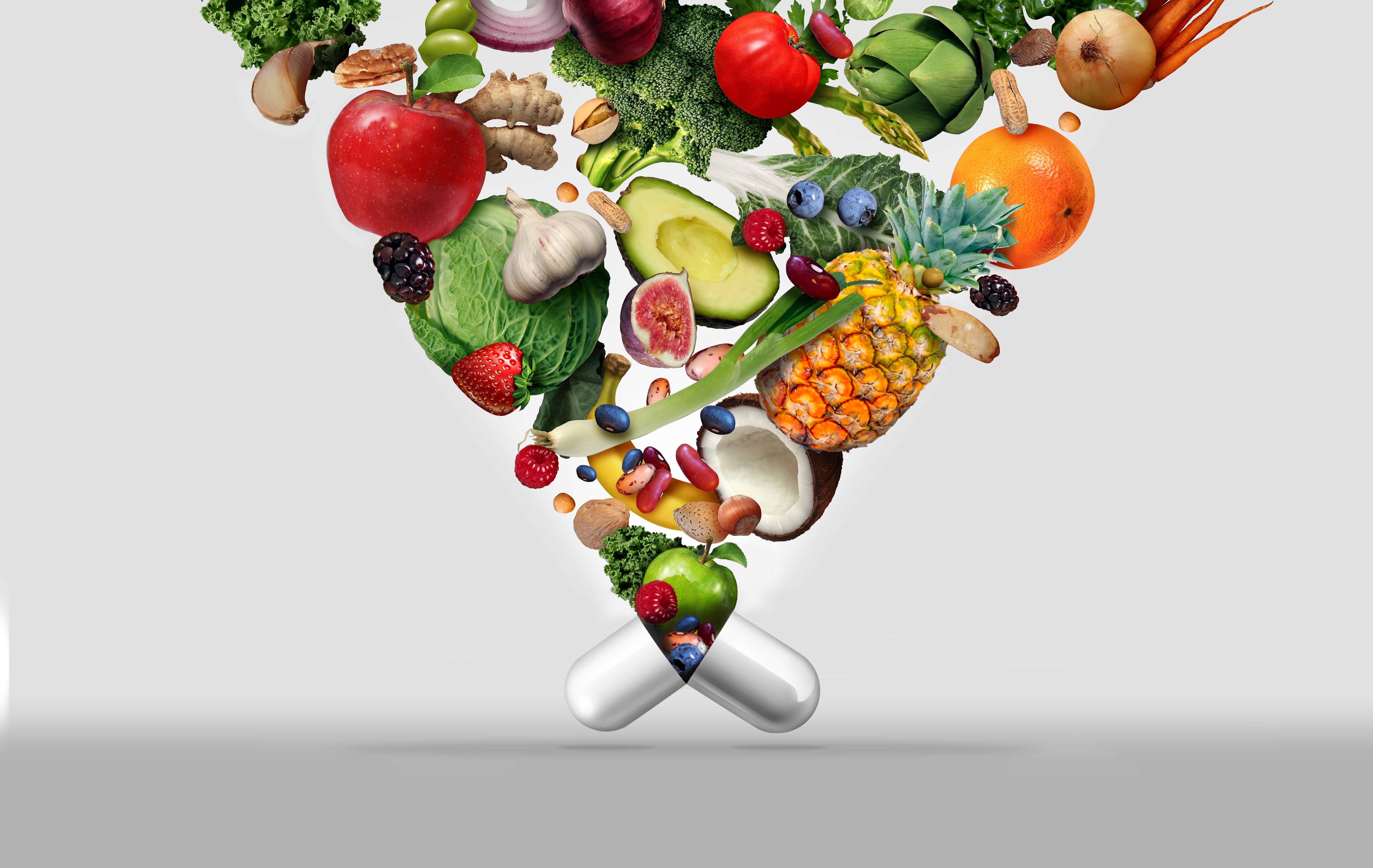 Mikronährstoff-Kapseln auf einer Hand